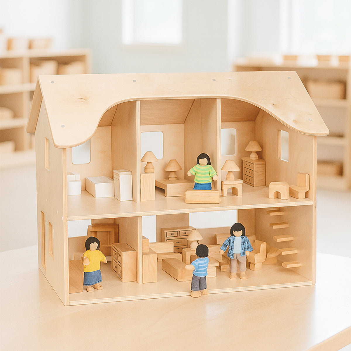 Wooden dollhouse with miniature furniture and dolls in a bright room.