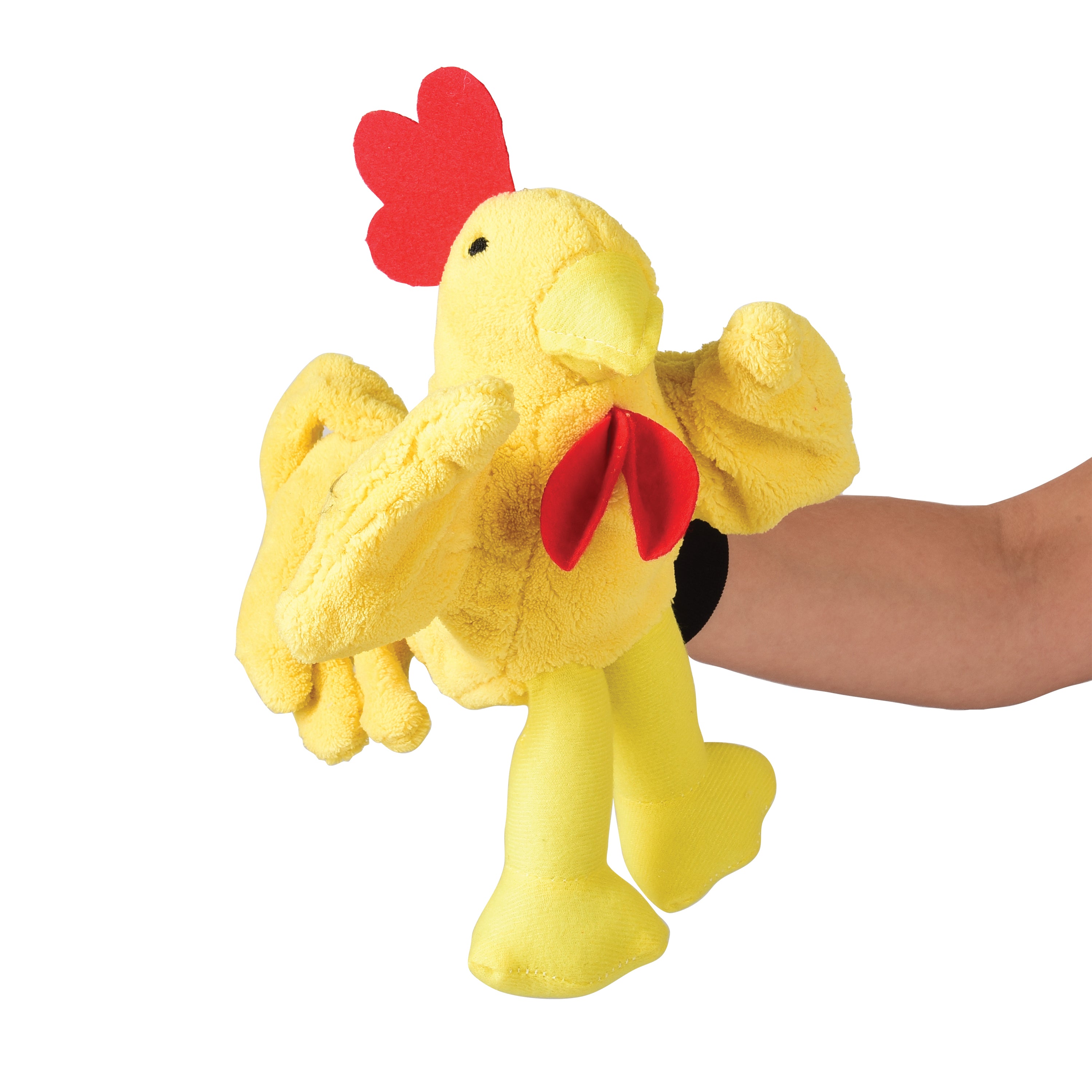 Yellow plush chicken toy with red accents held by a person on a white background