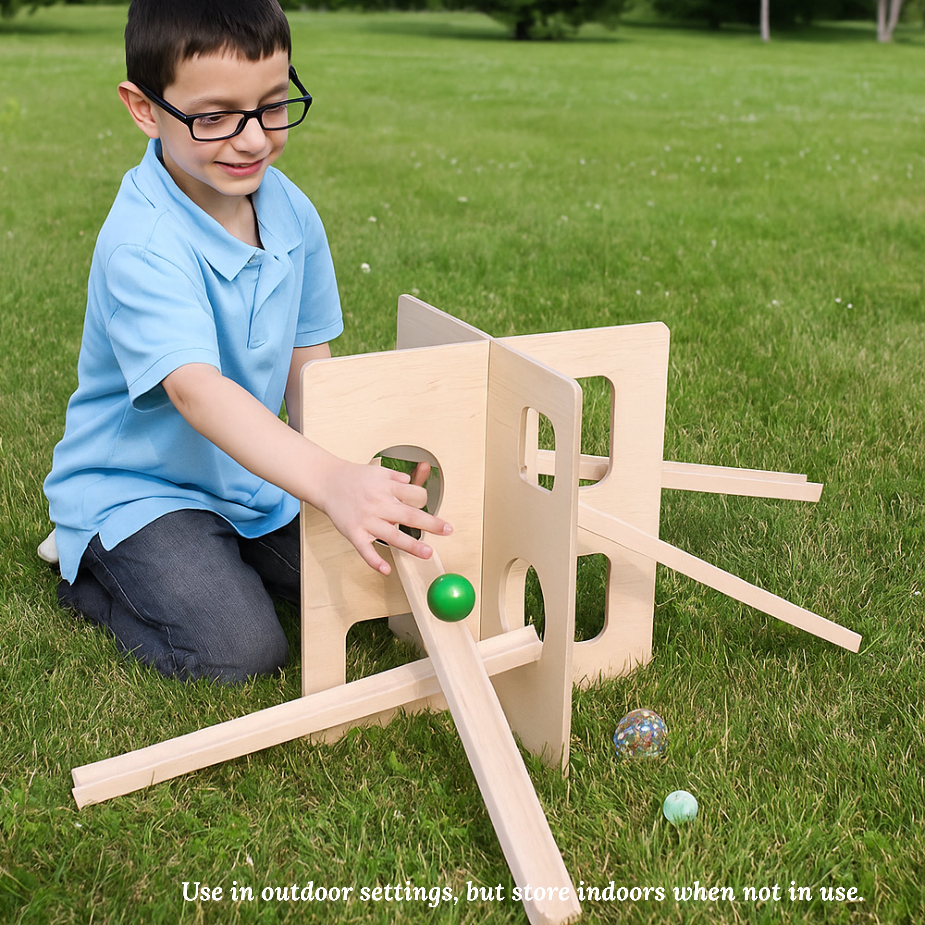Child playing with a wooden outdoor toy on grass