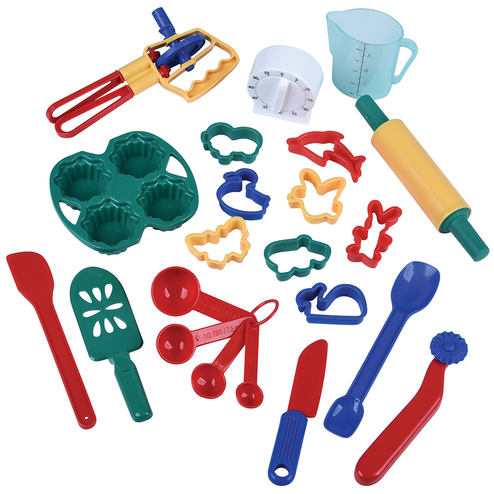 Set of colorful kitchen play utensils on a white background