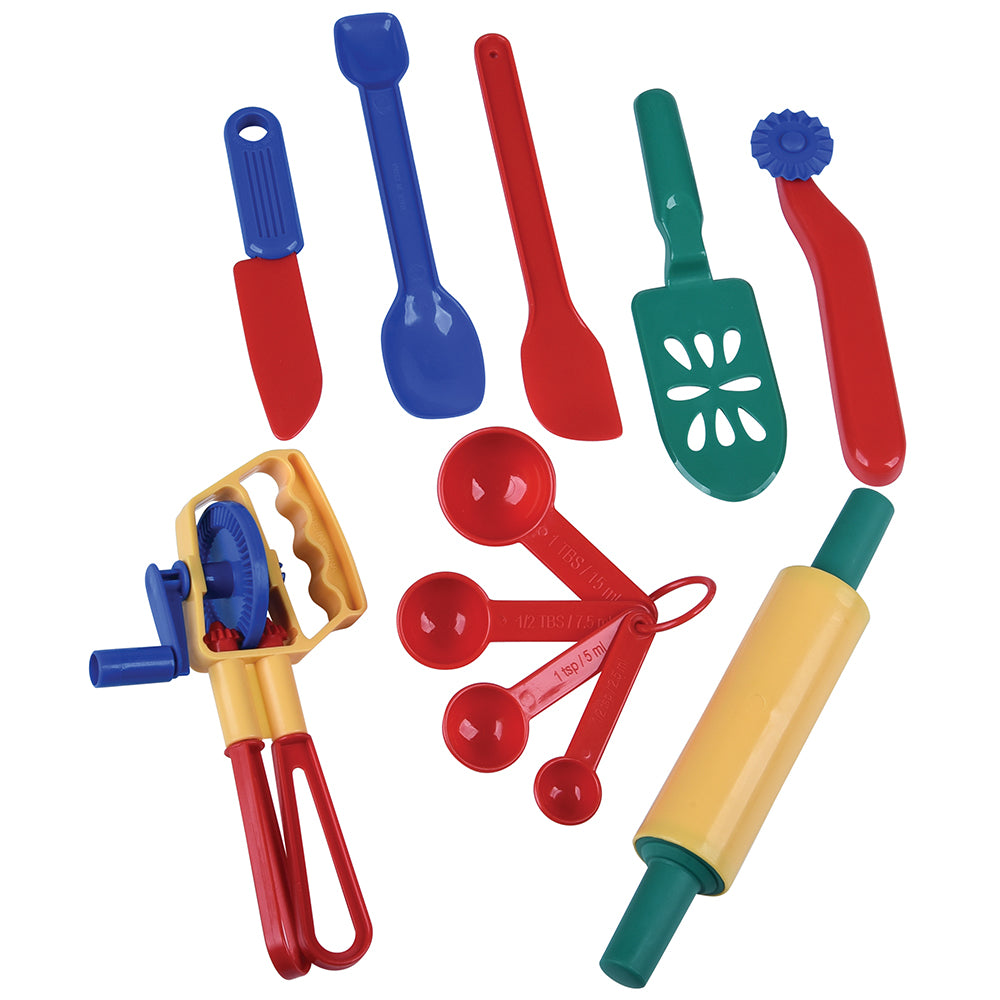 Colorful set of toy kitchen utensils on a white background