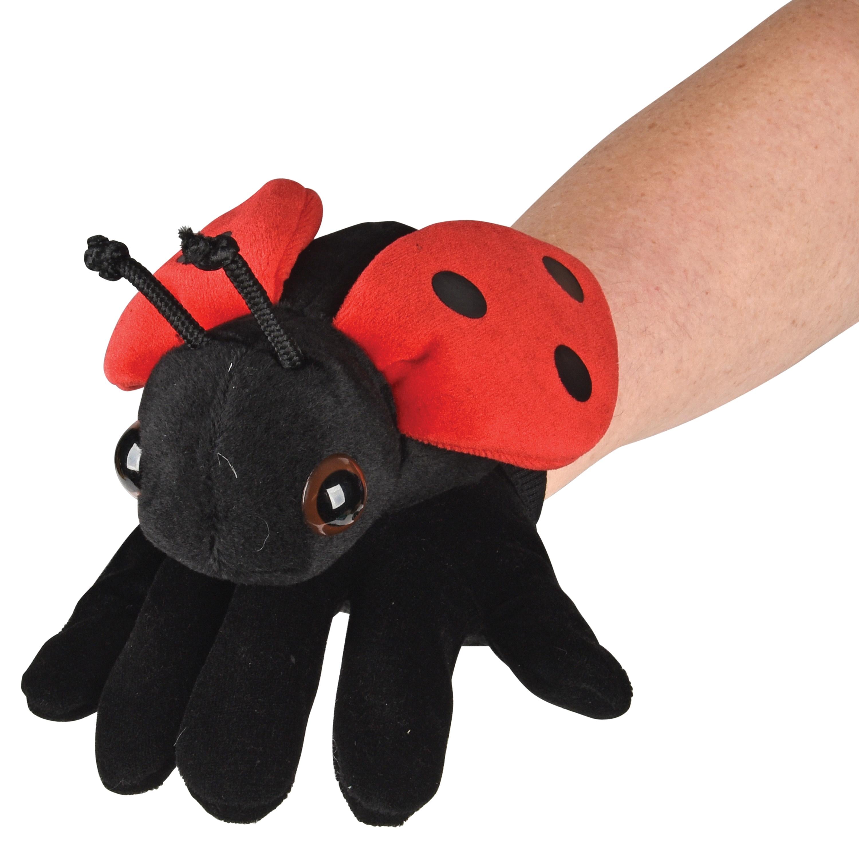 Black and red ladybug plush glove on a white background
