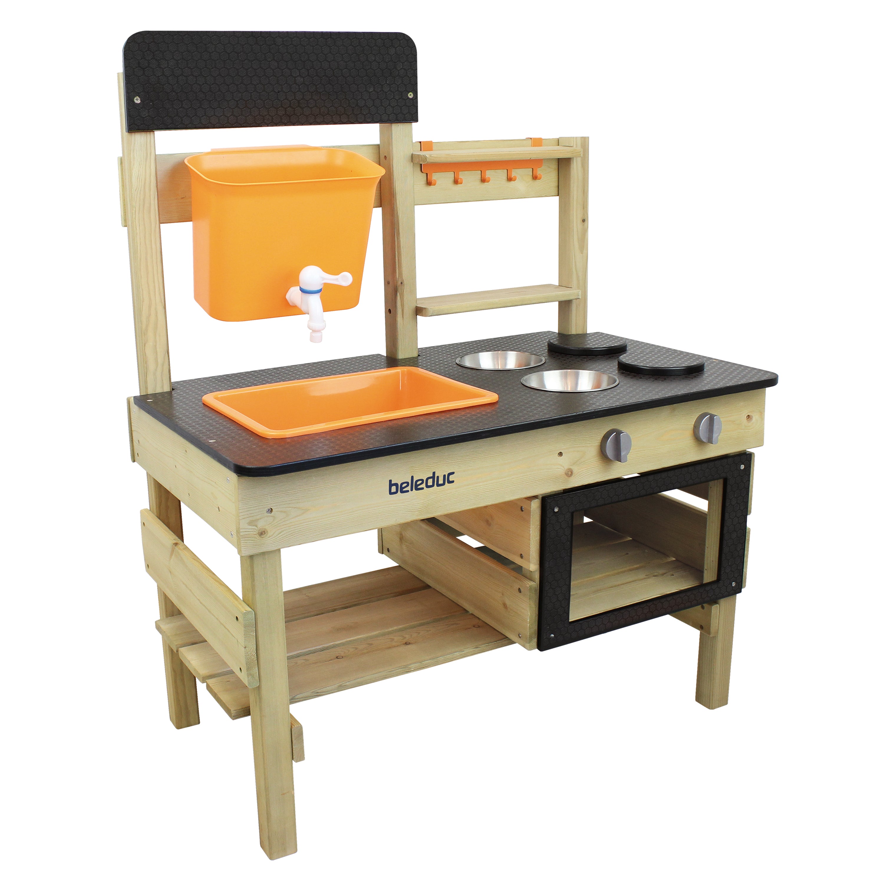 A wooden children's play kitchen set by Beleduc, featuring a light natural wood frame, black textured countertops, an orange sink basin, an orange hanging bucket with a faucet, two metal bowls, and an open storage shelf.