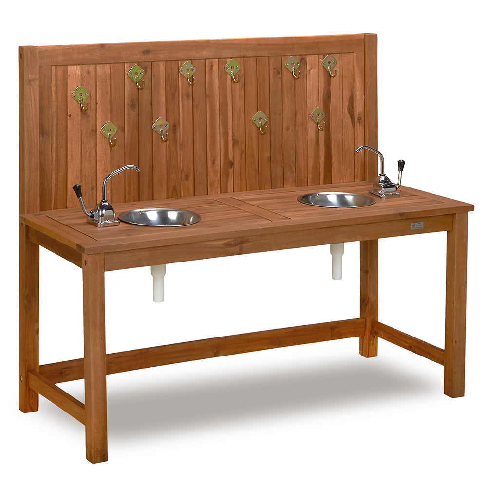 Wooden play kitchen with two sinks, faucets, and hooks on a white background