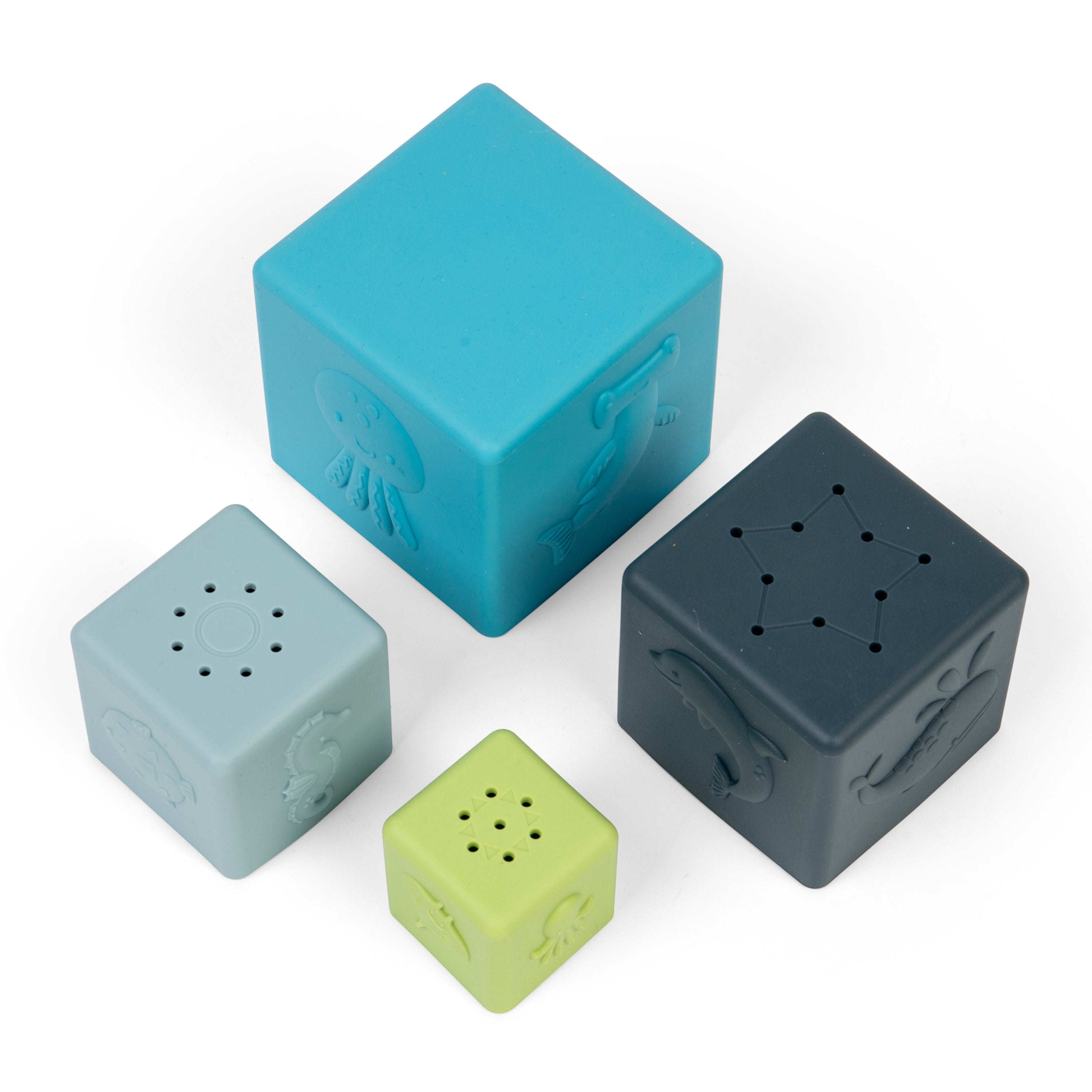 Four colorful blocks with unique designs on a white background