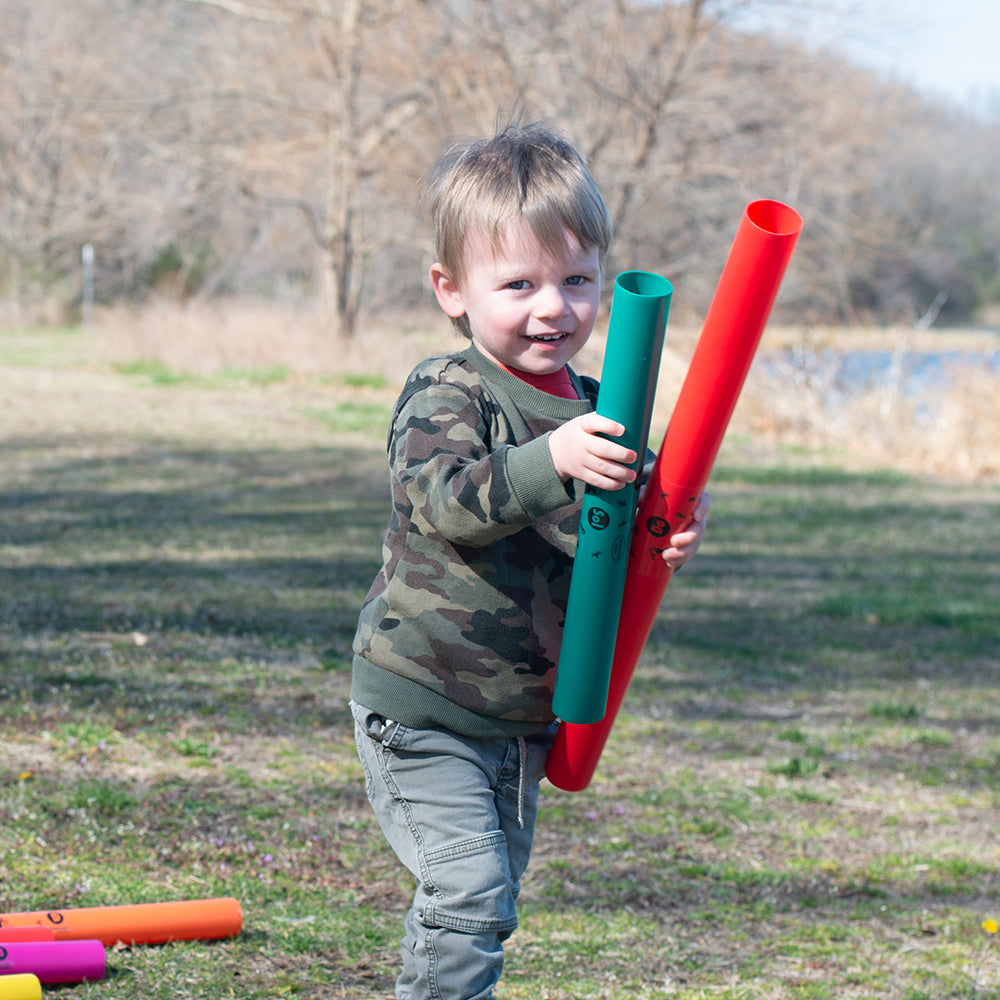 Kid Holding 2 Boomwhackers® Musical Tubes