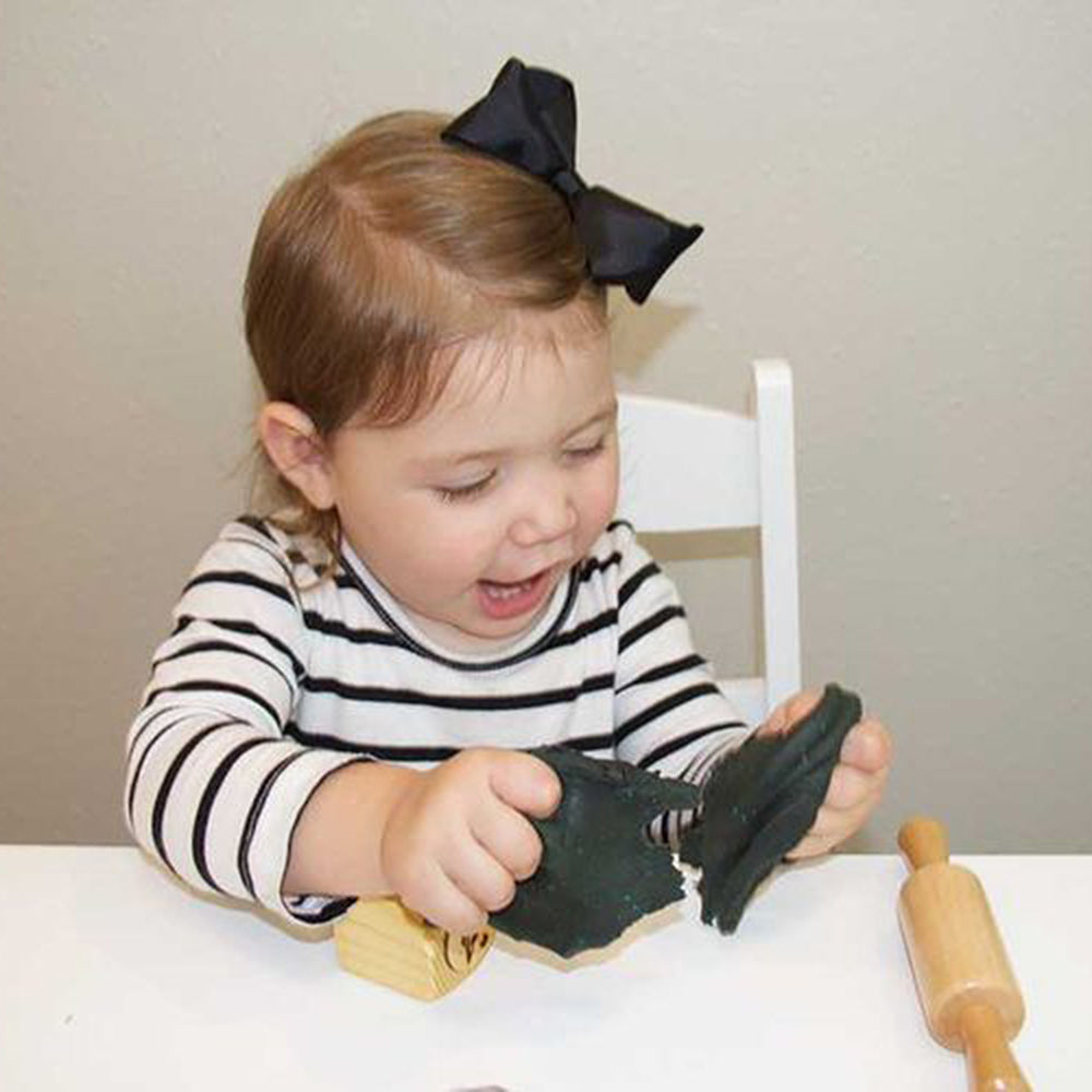 Toddler Playing with Clay