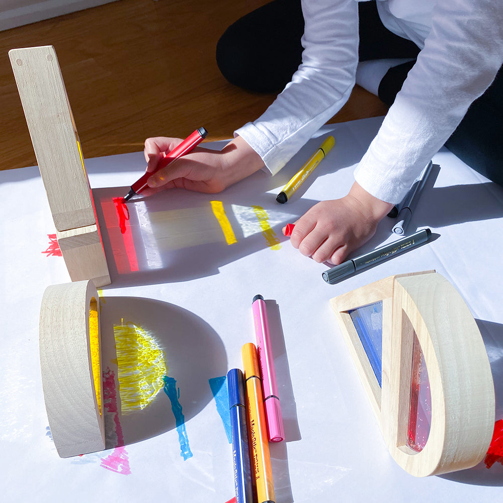 Using shape reflections with glitter water blocks for art