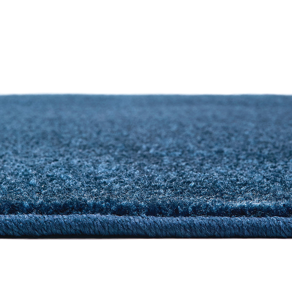 Double-stitched Serged Edges on Blueberry Colored Rug