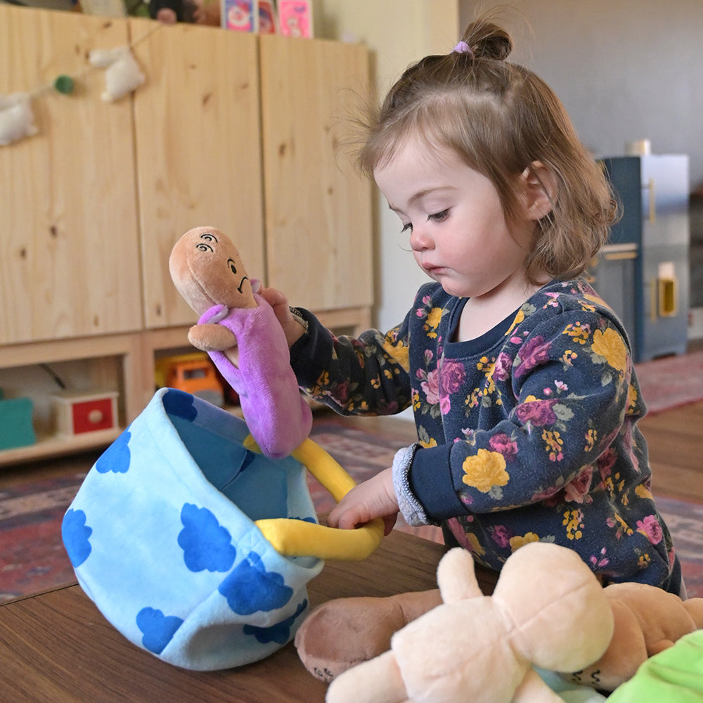 Storing Expression babies in Plush Blue Basket