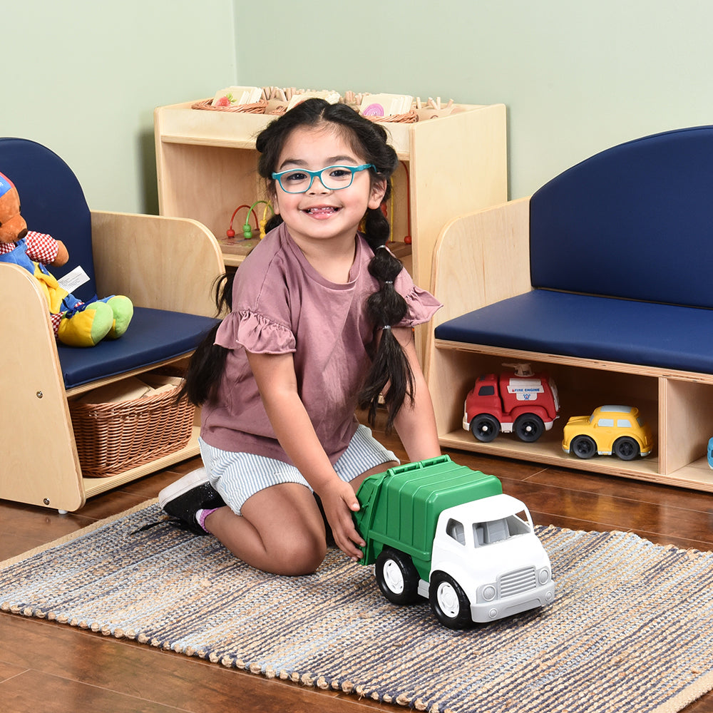 Kid in Classroom Playing with Toy Recycle Truck