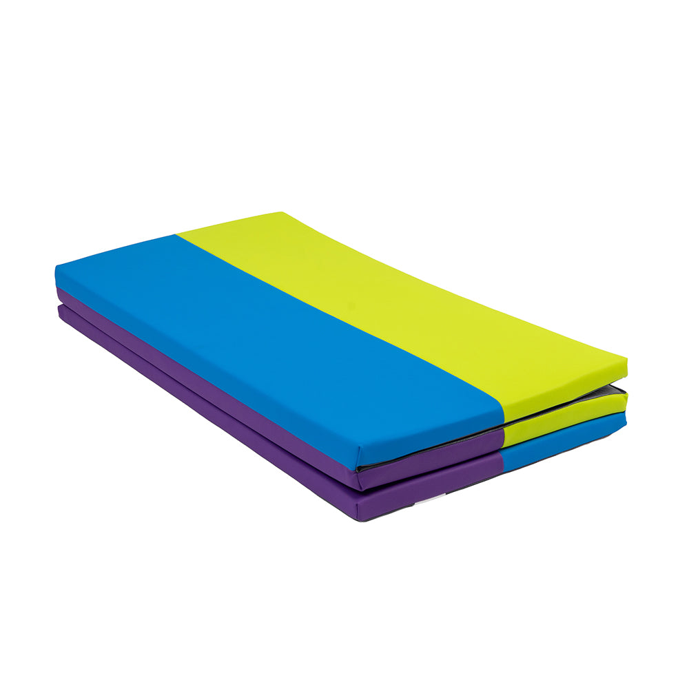 Folded colorful mat with blue, purple, and green sections on a white background