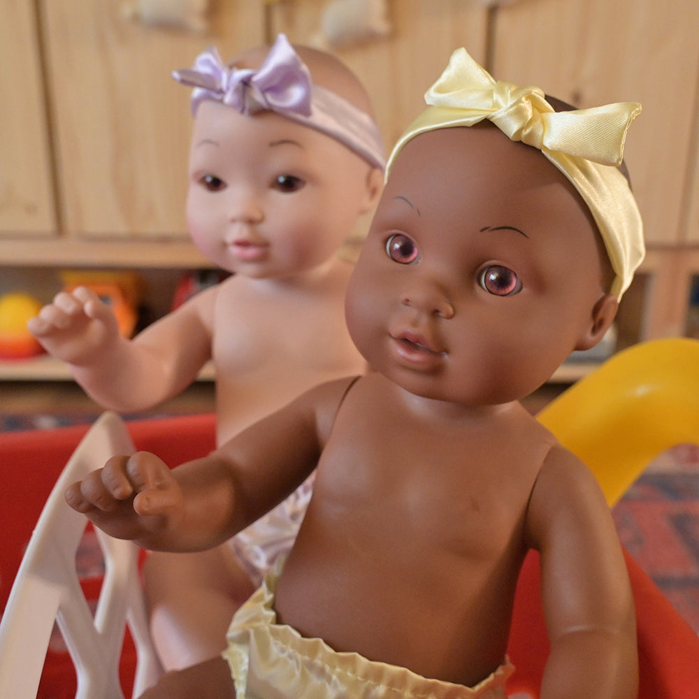 African American & Asian baby Dolls in Classroom