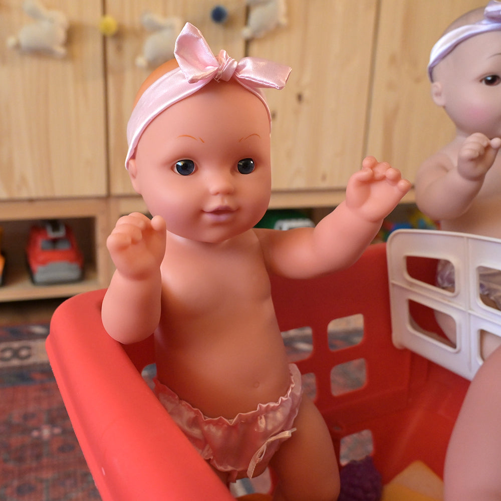 Caucasian Baby Doll in Classroom