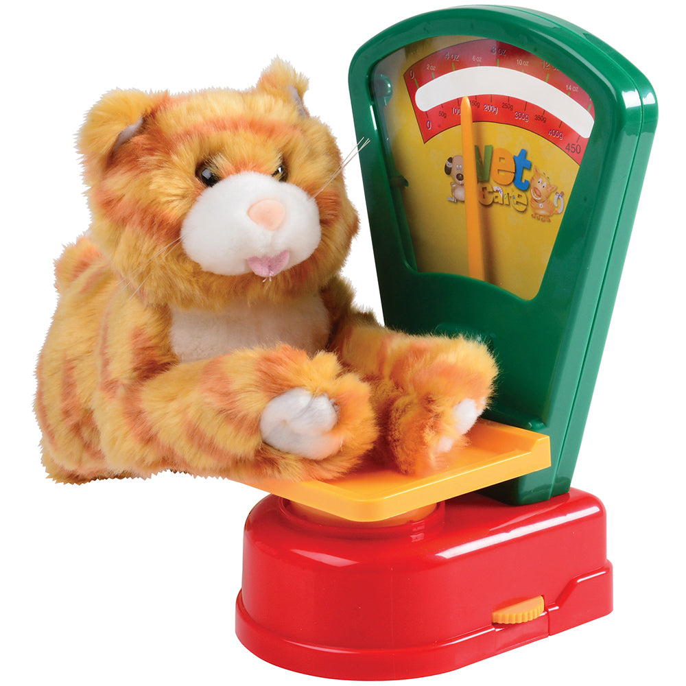 Stuffed cat on pretend play scale