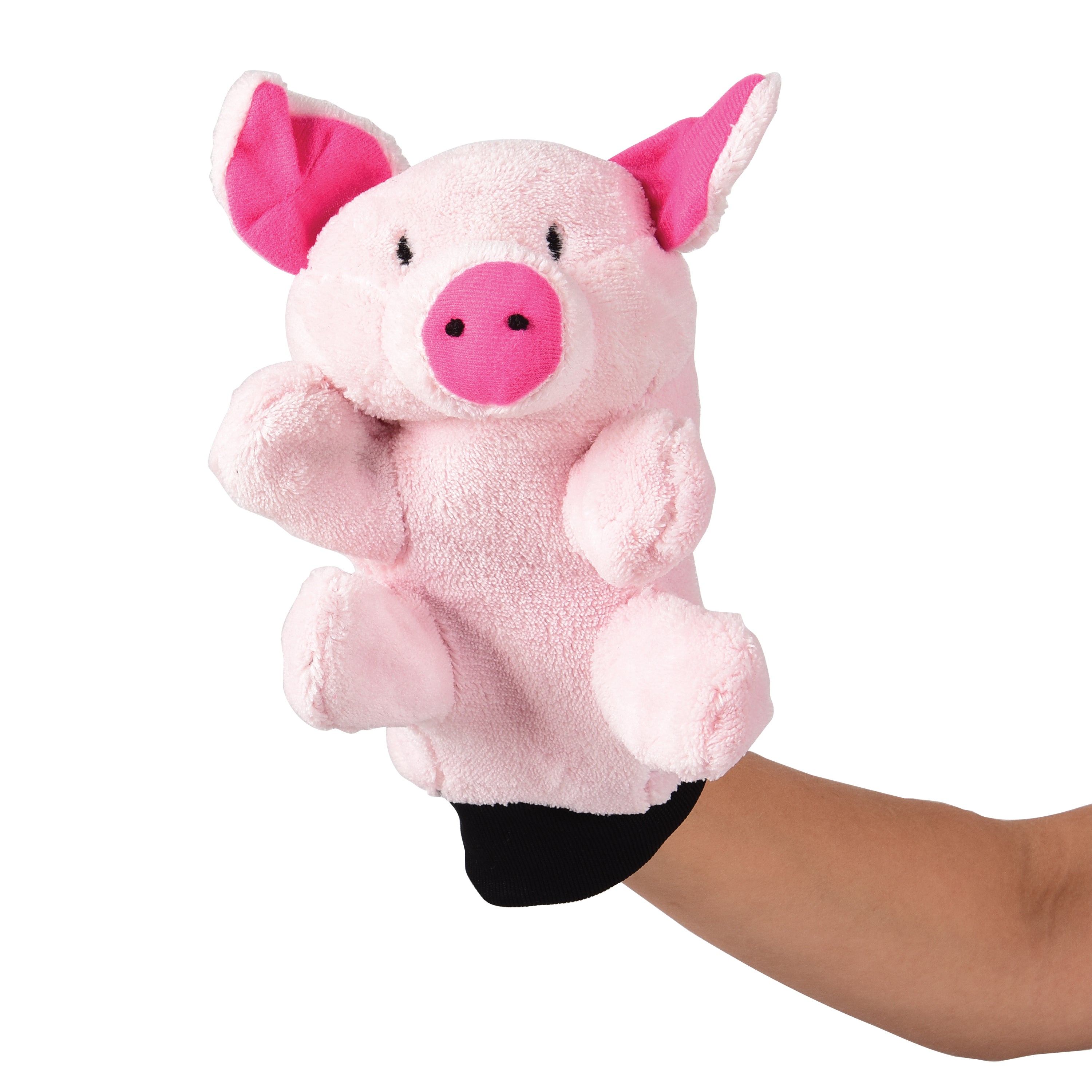 Pink plush pig toy held by a hand on a white background