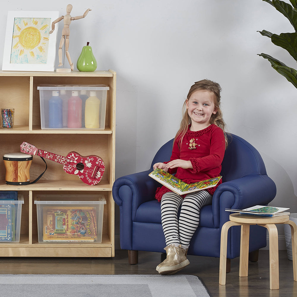 Kid Sitting in Little Lux Navy Preschool Lounge Chair in classroom