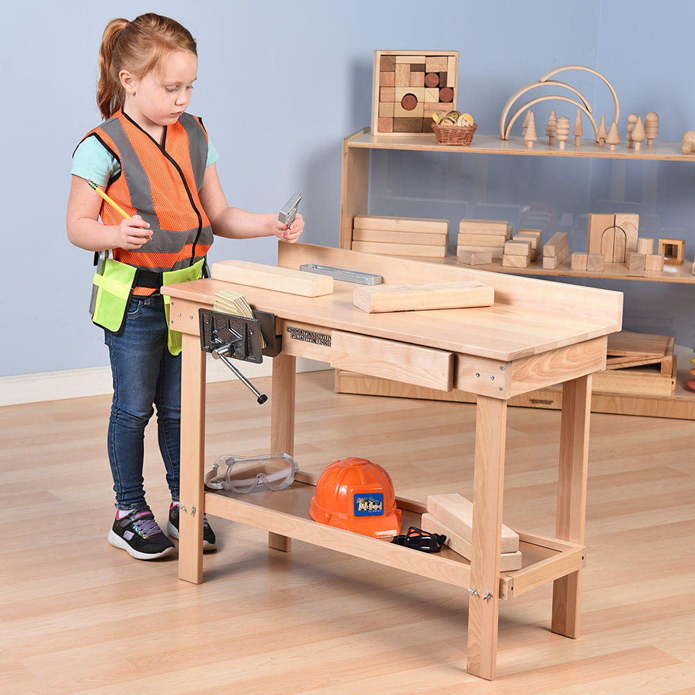 Kid Using Carpentry Workbench for Projects