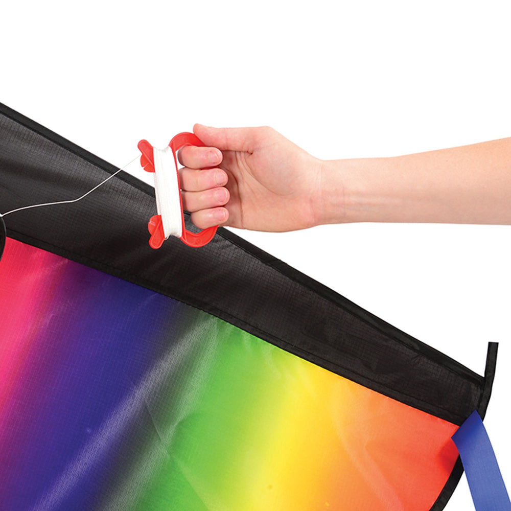 Hand Gripping Handle of Rainbow Dragon Tail Kite