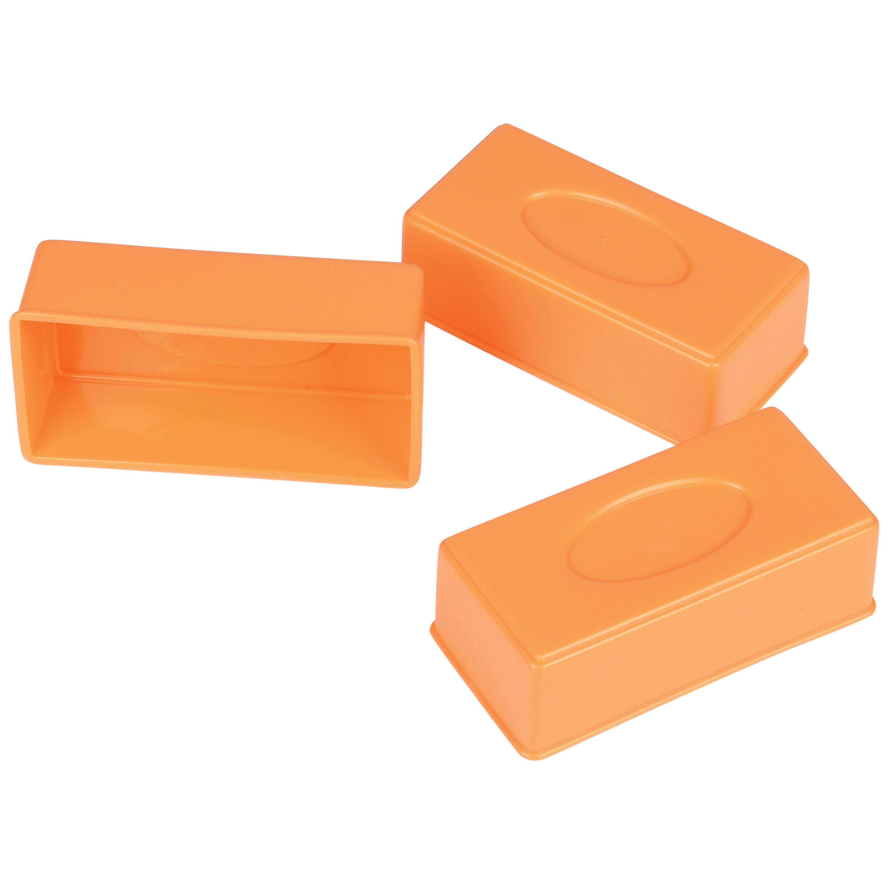 Three orange plastic blocks on a white background