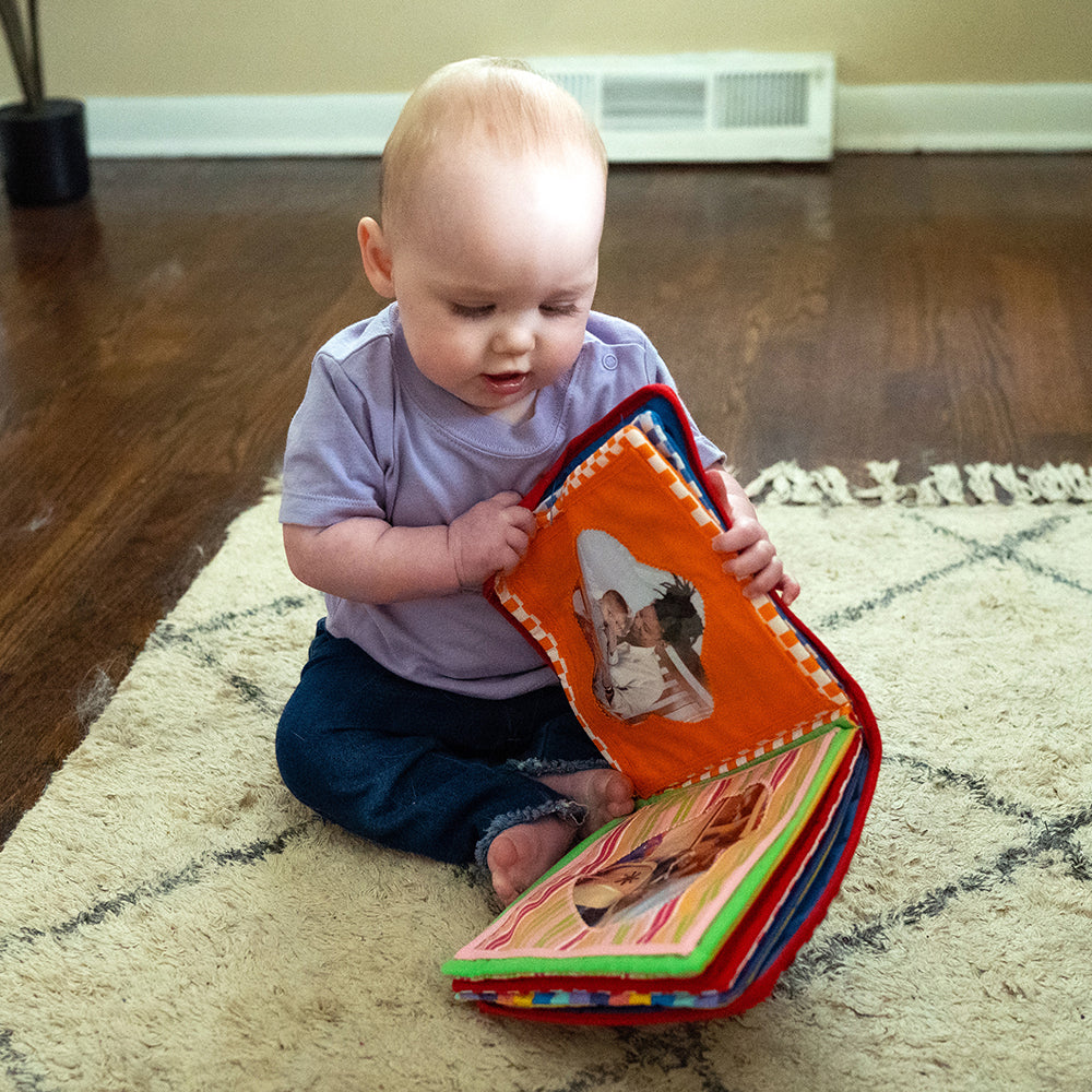 Infant Turning Cloth Pages of Baby's First Photo Album
