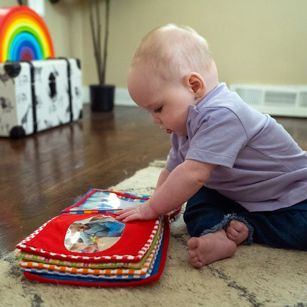 Baby with Baby's First Photo Album