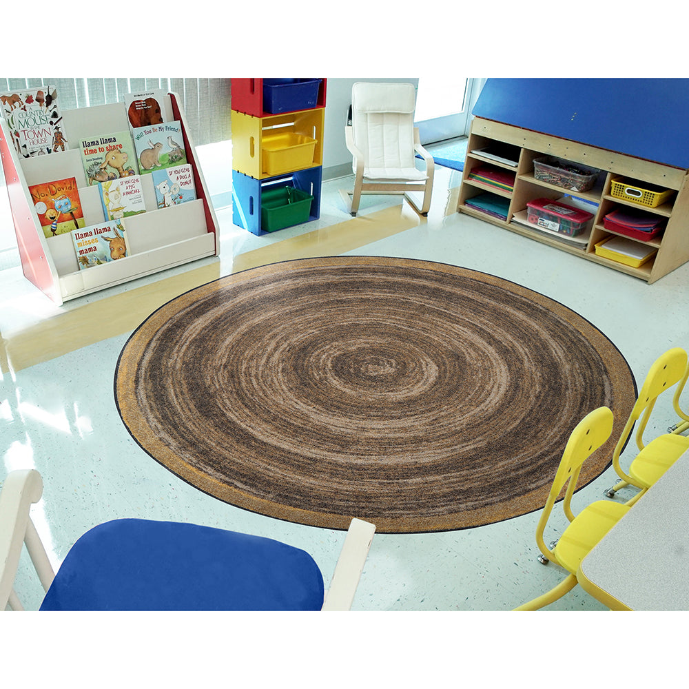Feeling Natural Walnut Circular Area Rug in the classroom