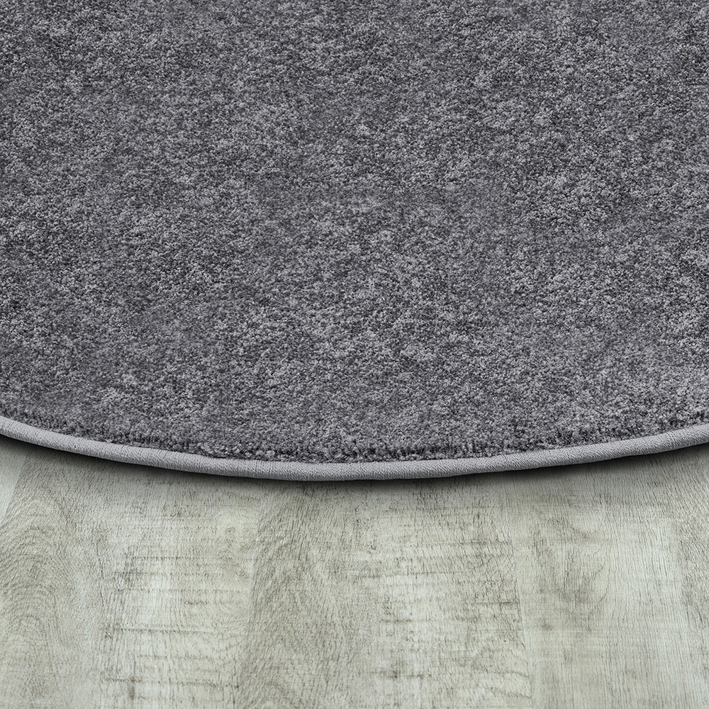 Serged Edges of Oval Silver Area Rug