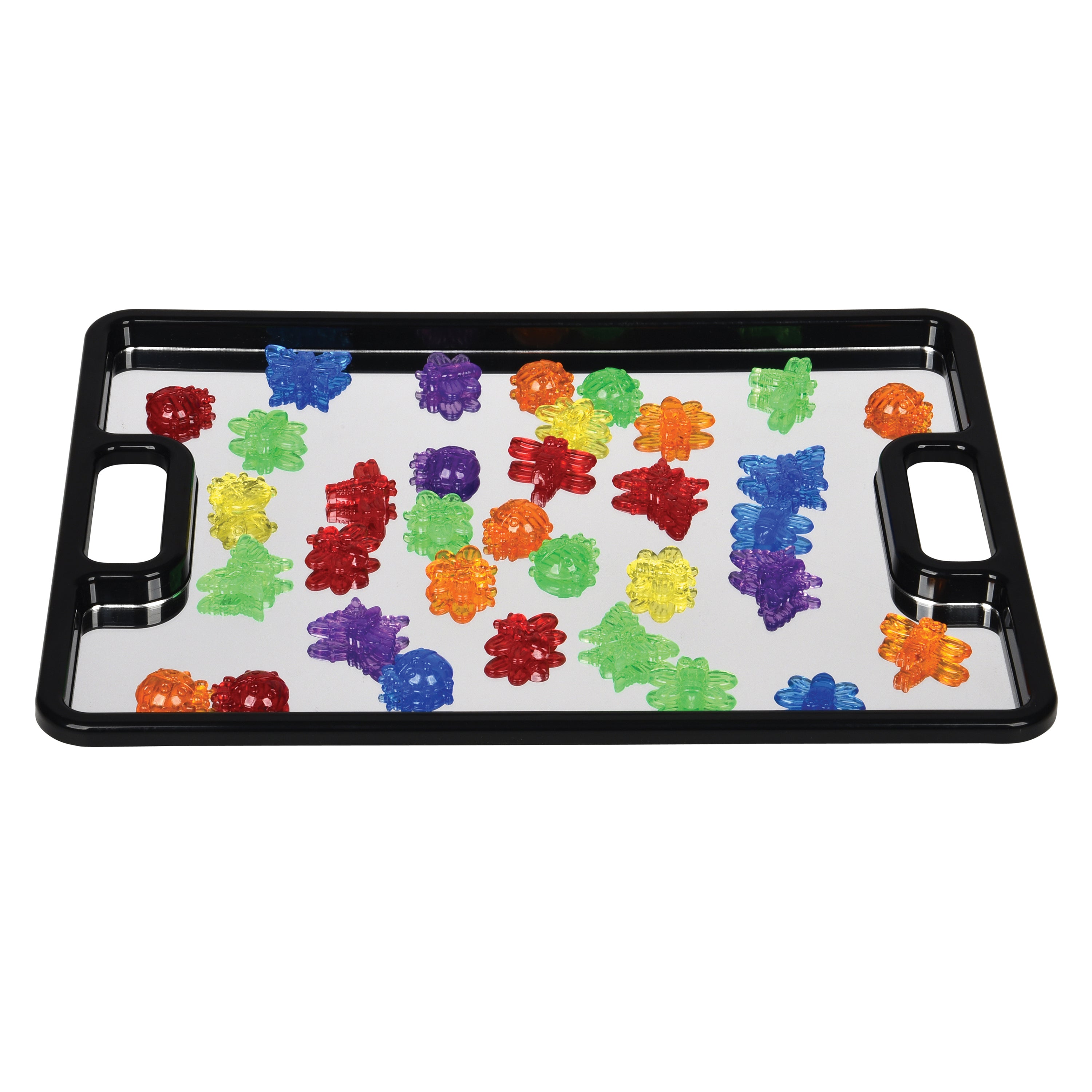 Colorful transparent figurines on a black tray with mirrored surface