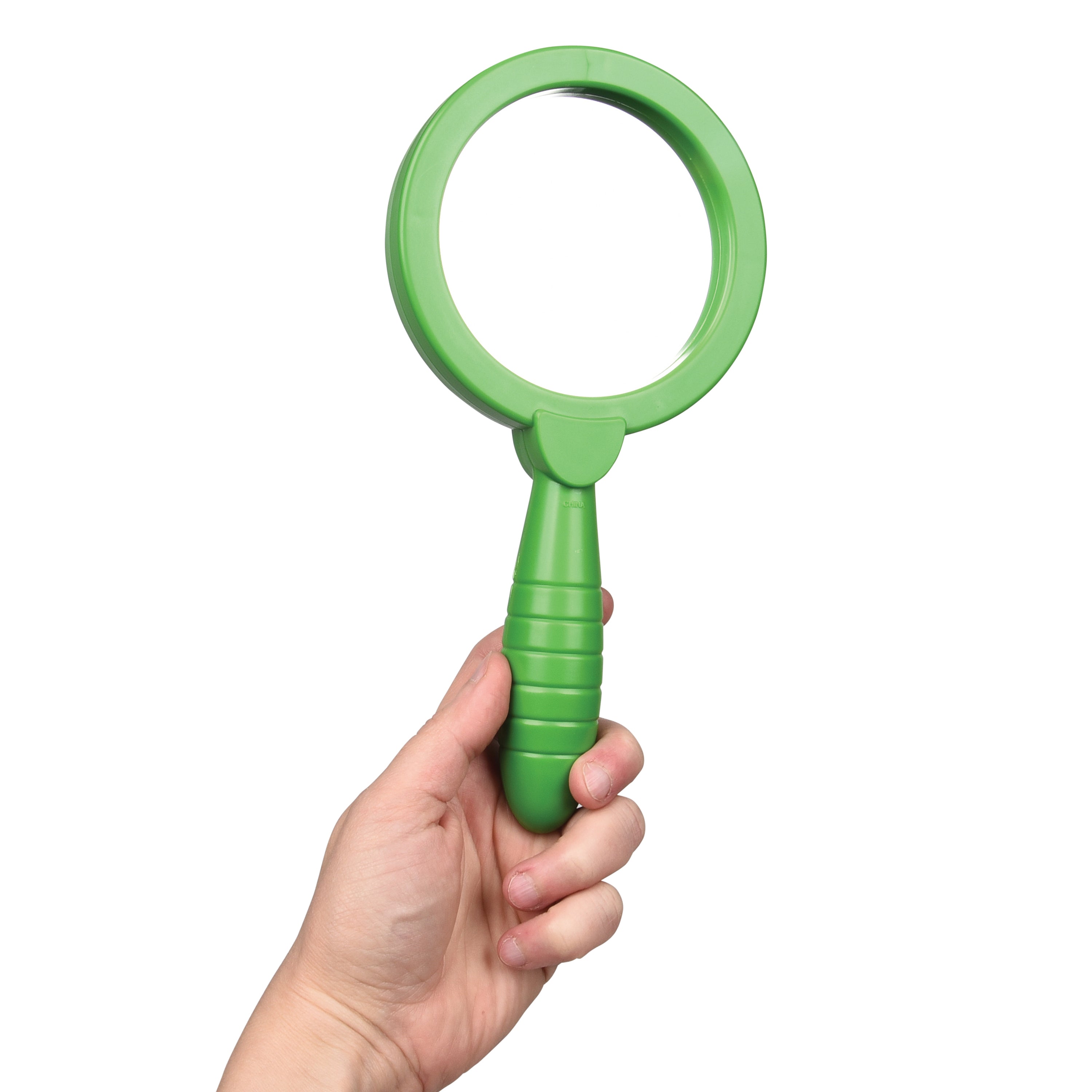 Green magnifying glass held in a hand against a white background
