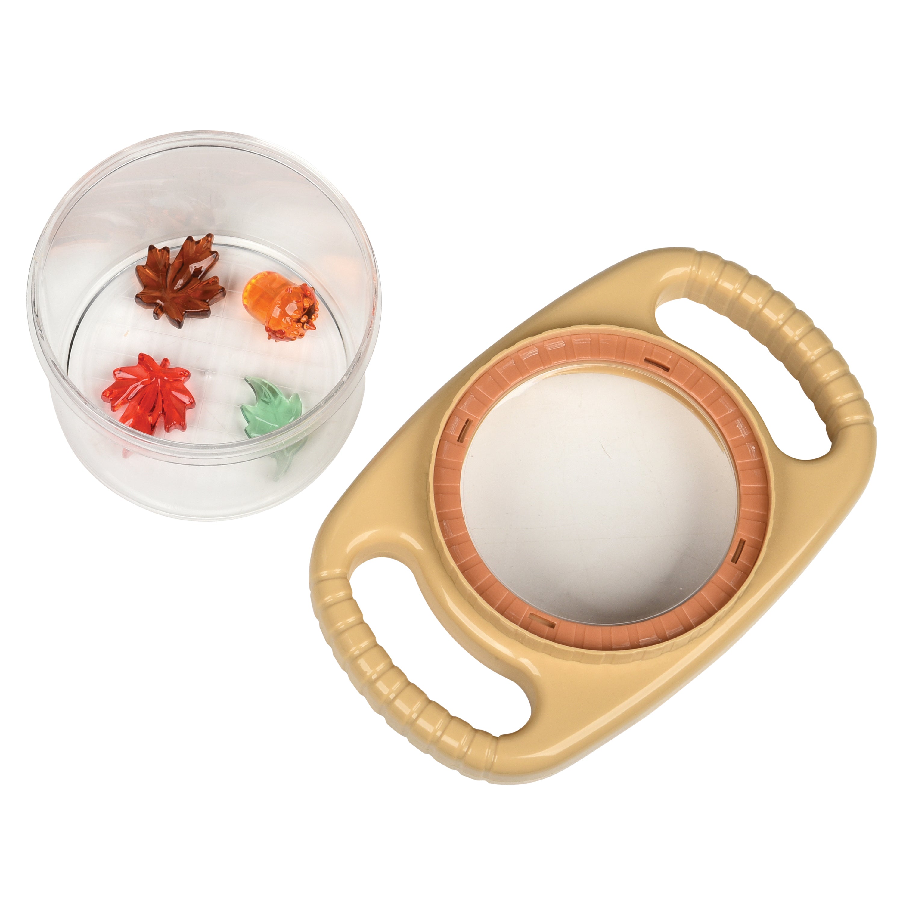 Beige magnifier with a transparent container featuring colorful autumn toys on a white background