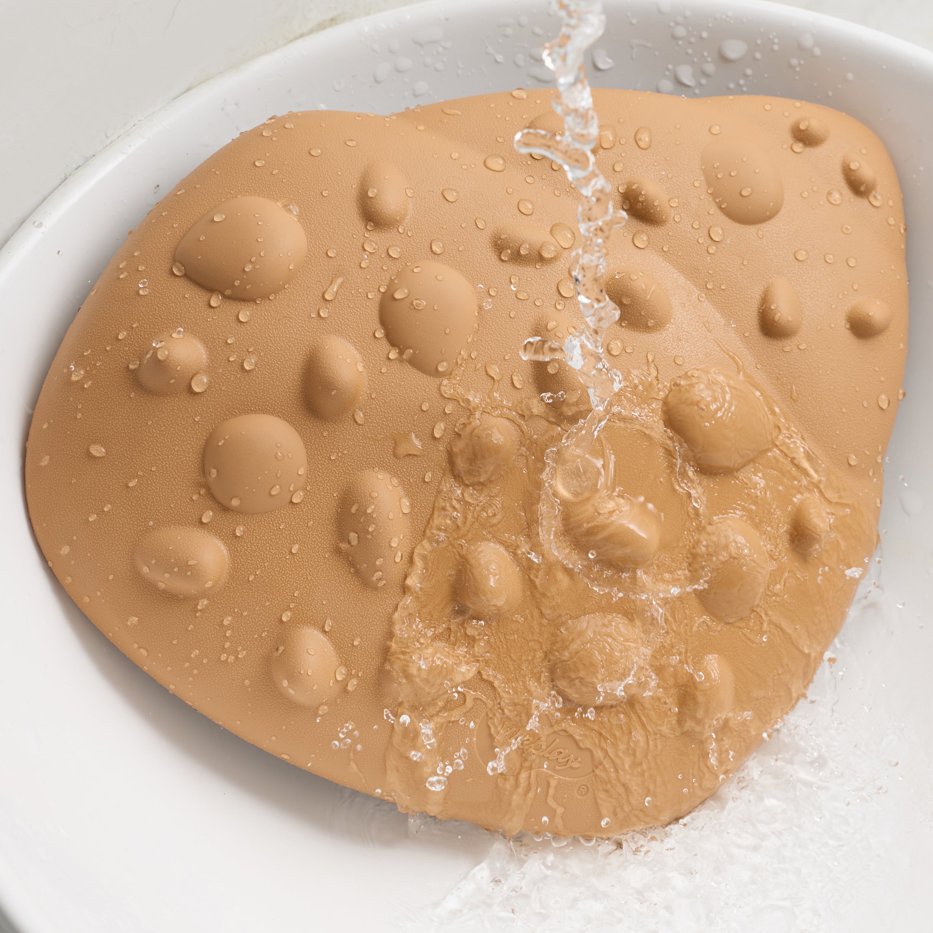 Washable tactile shells in a sink