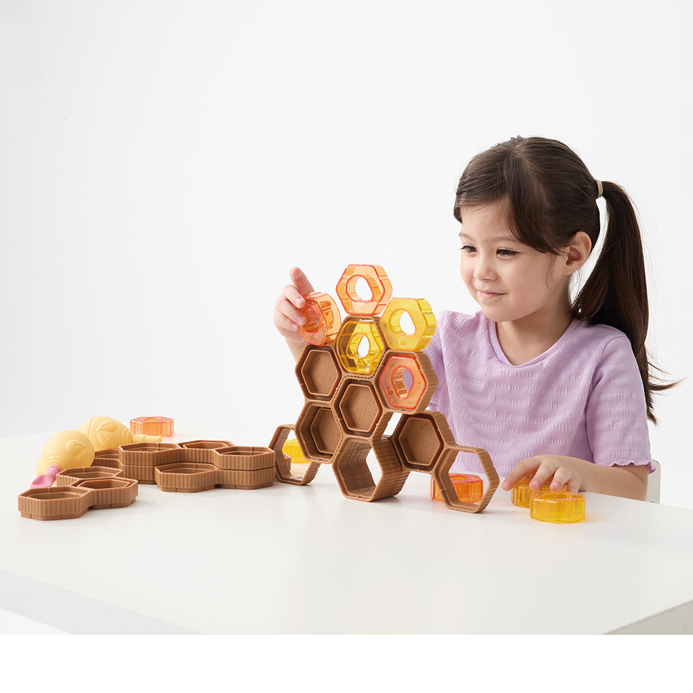 Kid Building with Squeezy Bee Blocks