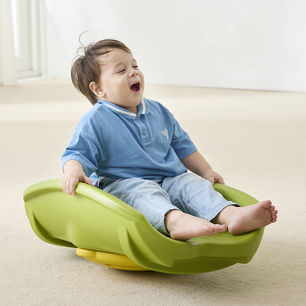 All Smiles with Rocking Leaf Boat