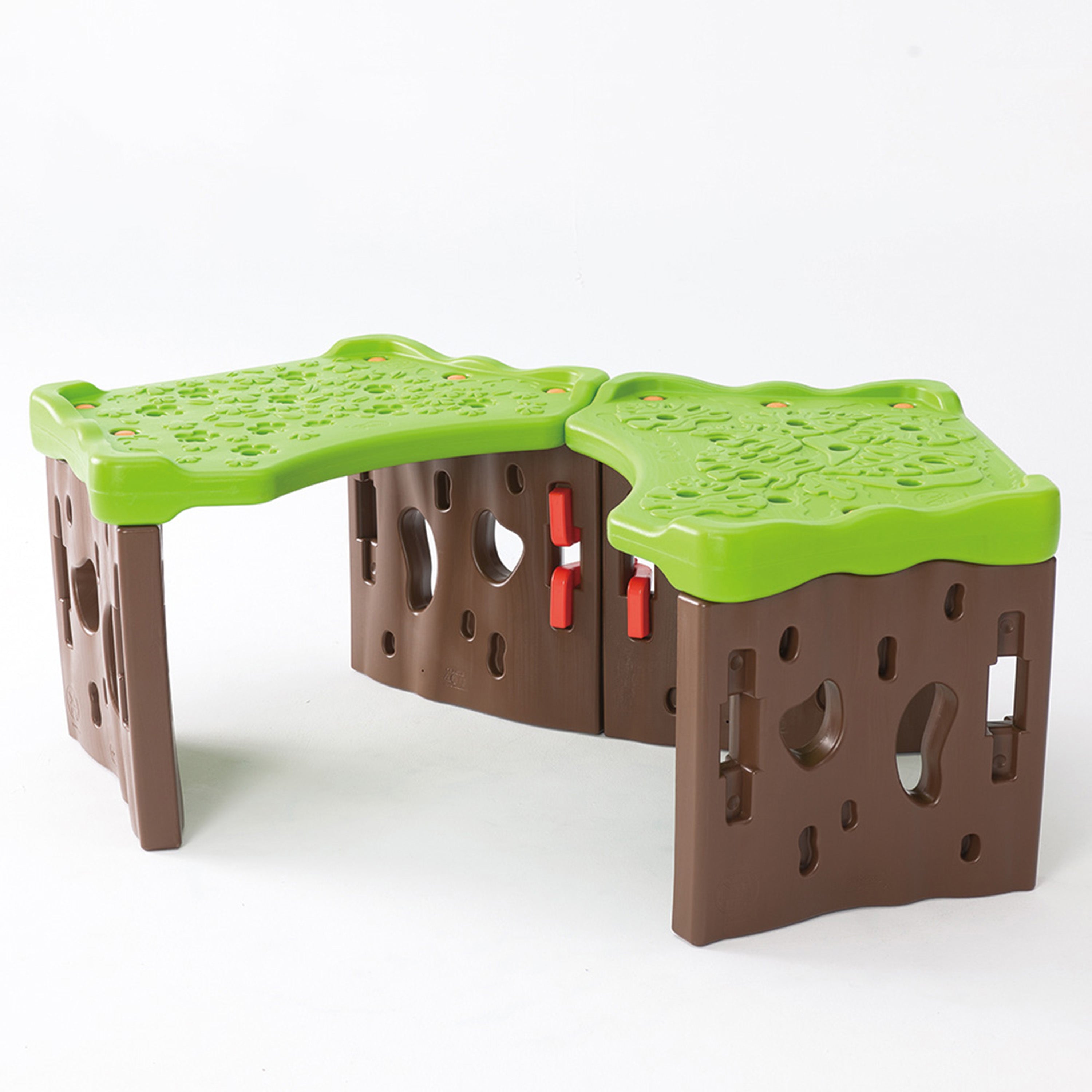 Children's play table with green top and brown base on a white background