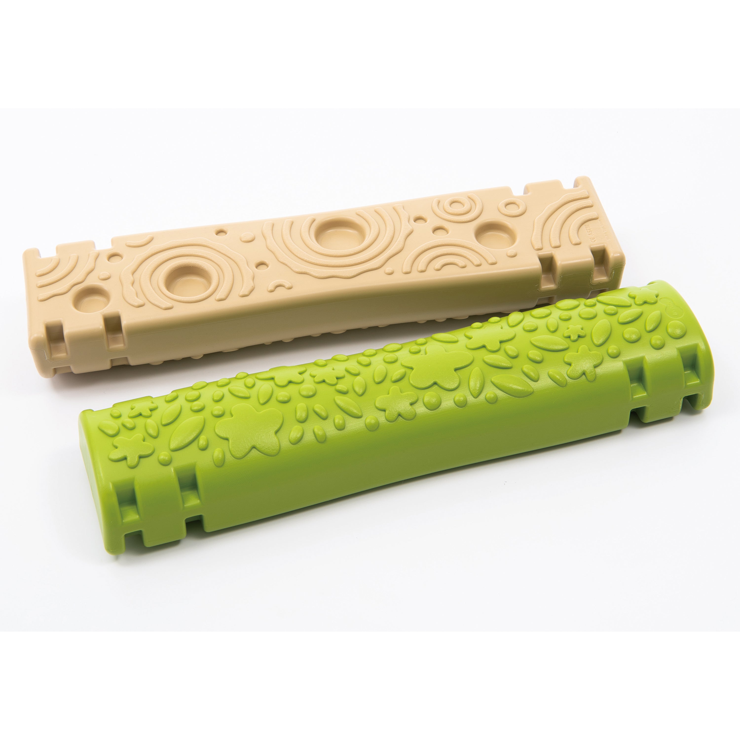 Beige and green plastic components on a white background