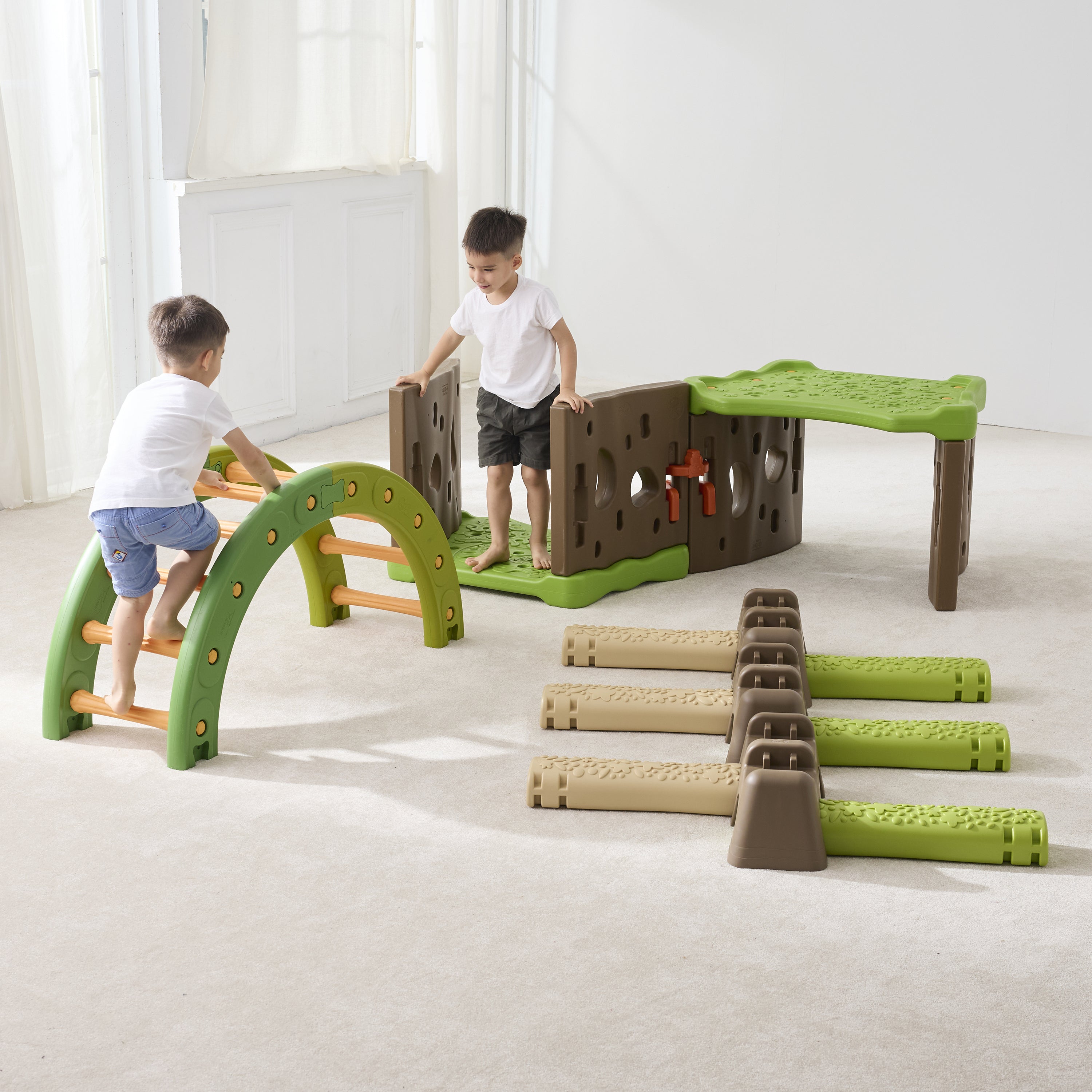 Children playing with a modular play structure in a bright room.