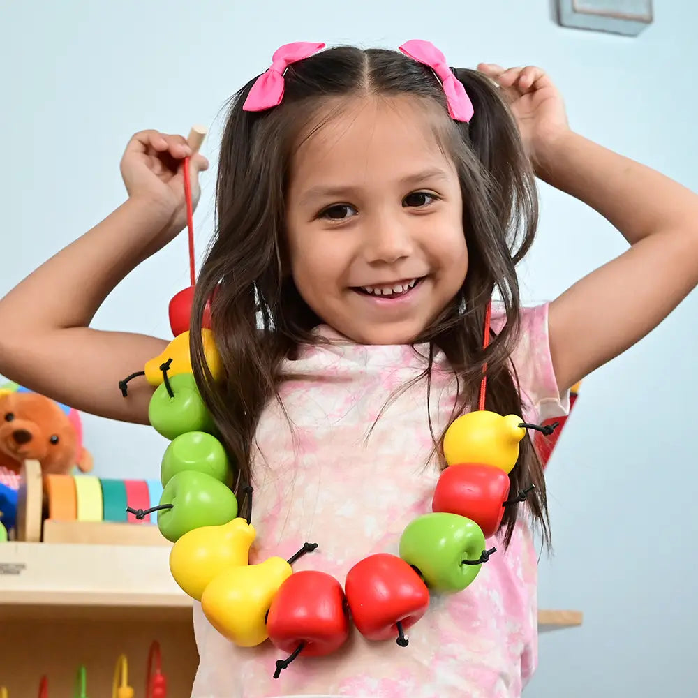 Interacting with Threaded Wooden Fruits