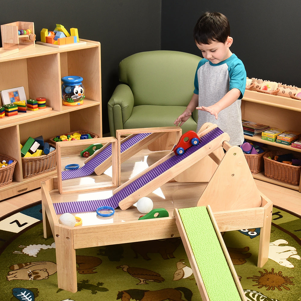 Exploring Movement with Ramps on the Toddler Manipulative Table