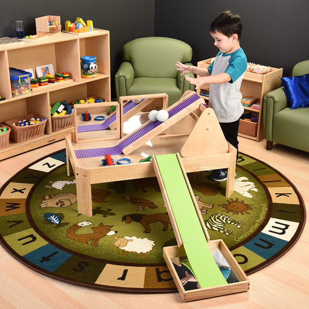 Toddler Manipulative Table Used In A Classroom Environment