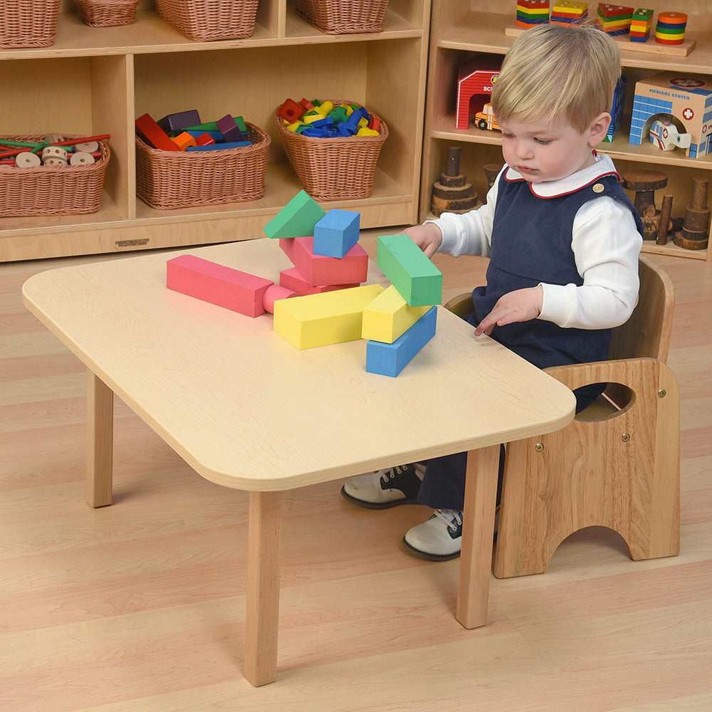 Toddler Using Classic Hardwood Toddler Table in the Classroom