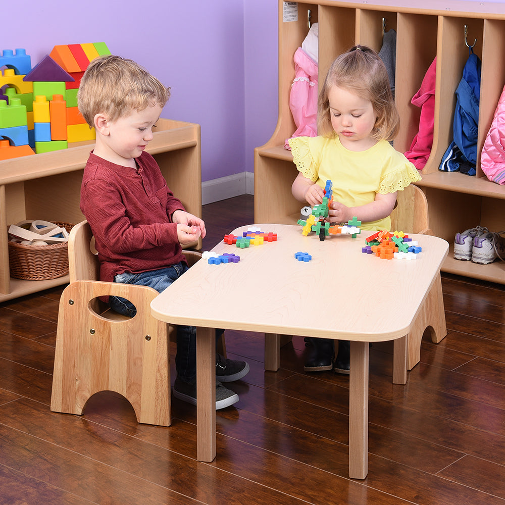 Two Kids Seated at Classic Hardwood Toddler Table in the Classroom