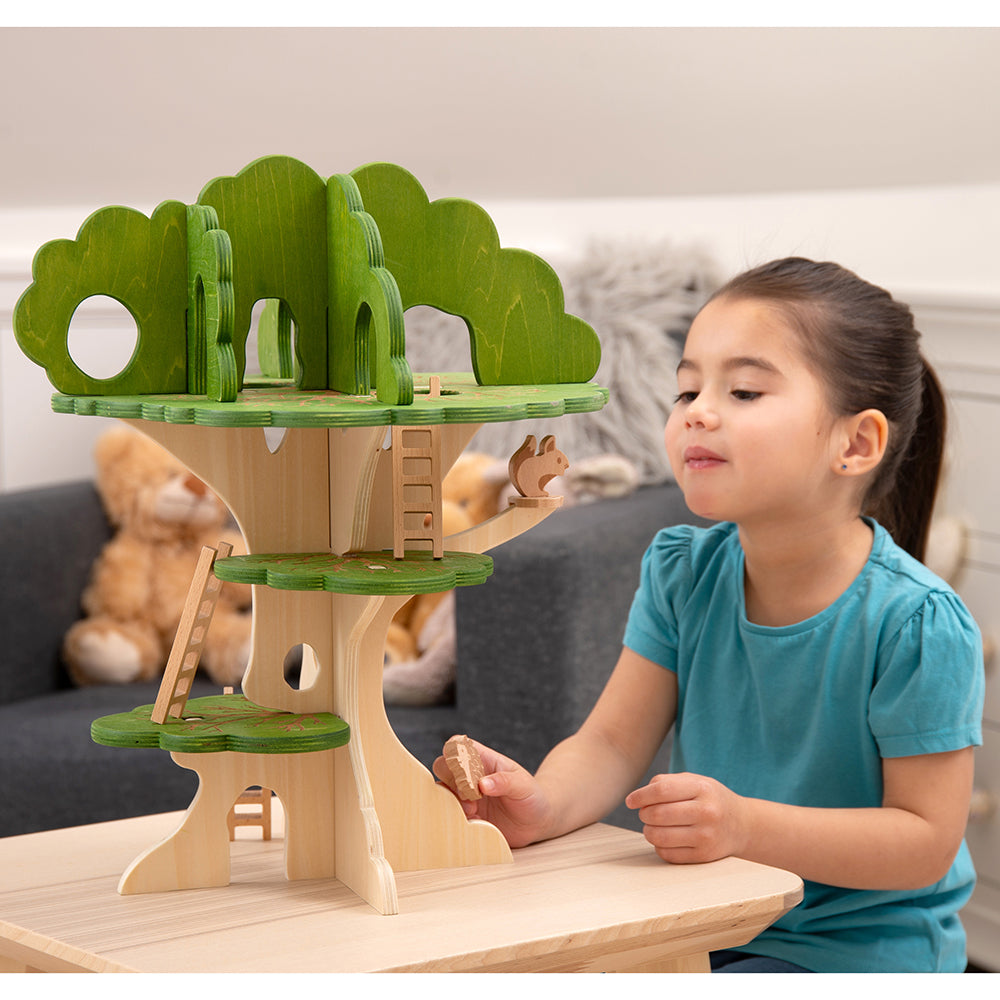 Kid Interacting With 3-Tier Woodland Treehouse Playset
