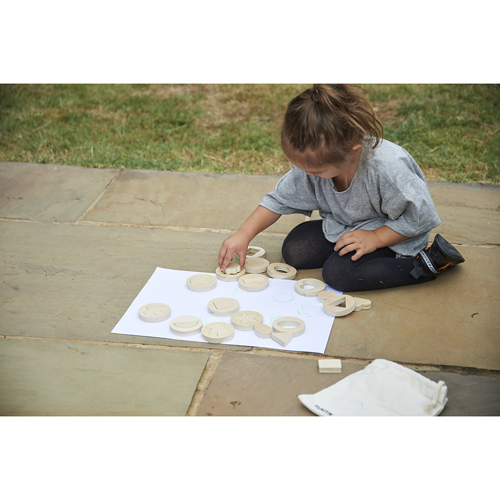 Exploring the world with Inside Outside Wooden Shapes