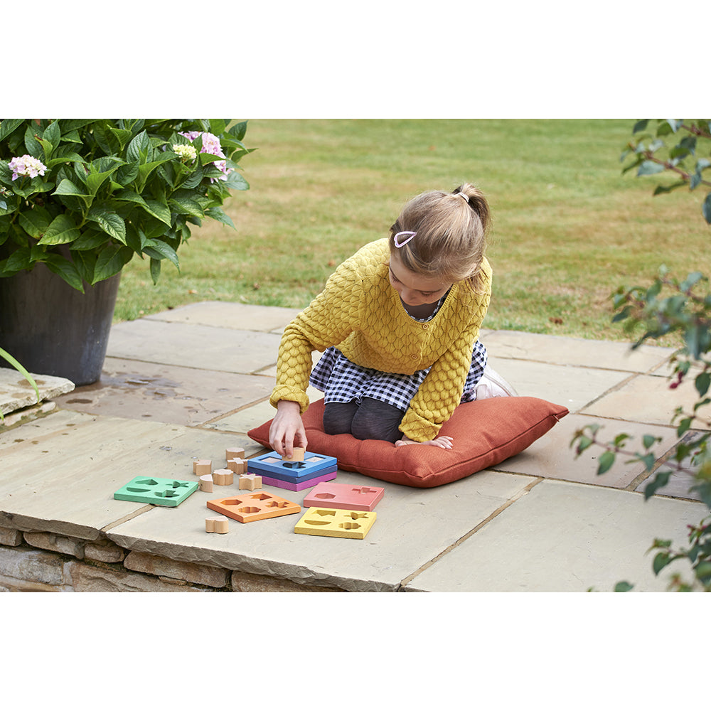 Fitting Wooden Shapes in Rainbow Stacker