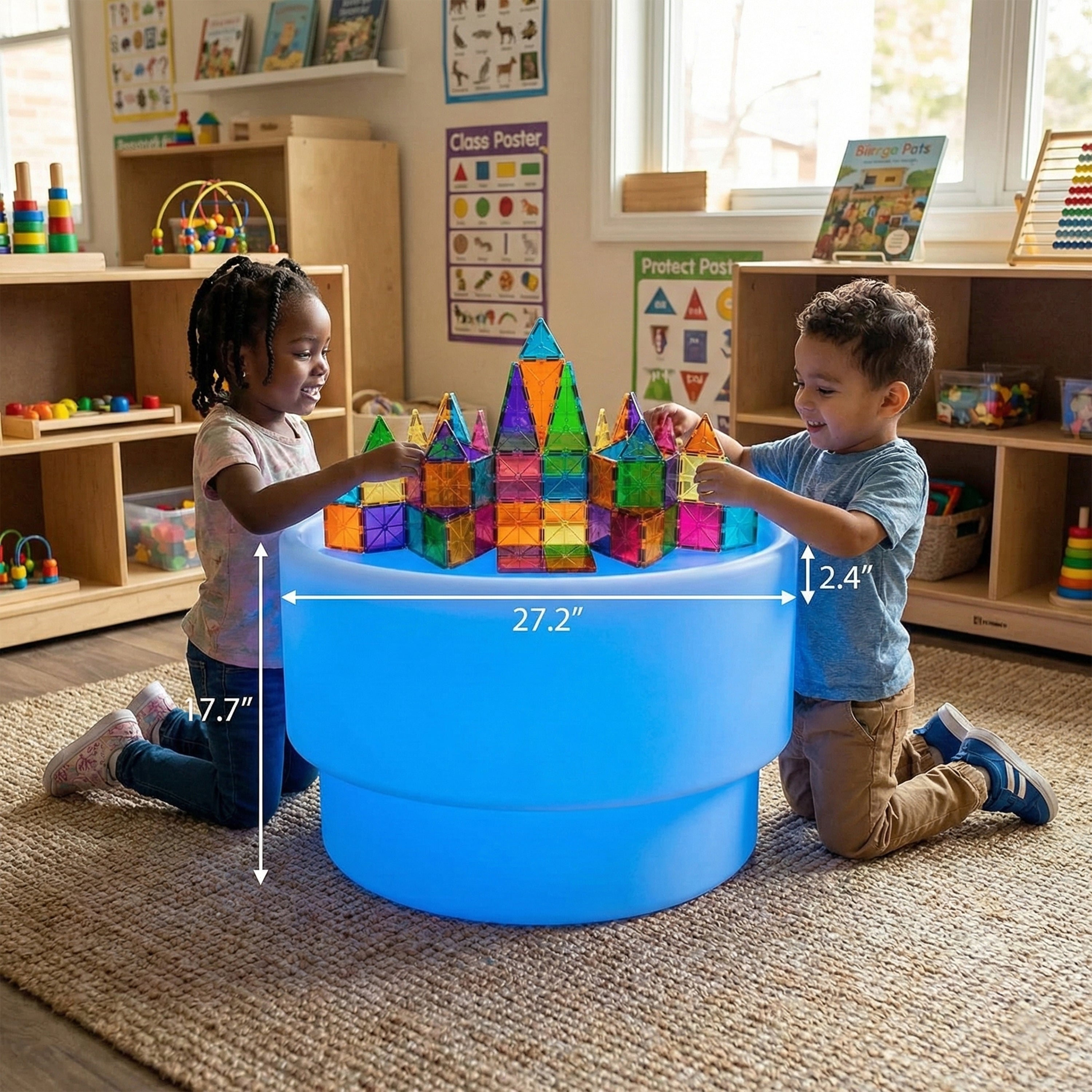 Children playing with colorful building blocks on a blue activity table in a classroom setting.