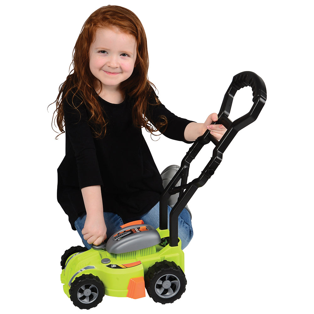 Child with Realistic Play Lawn Mower