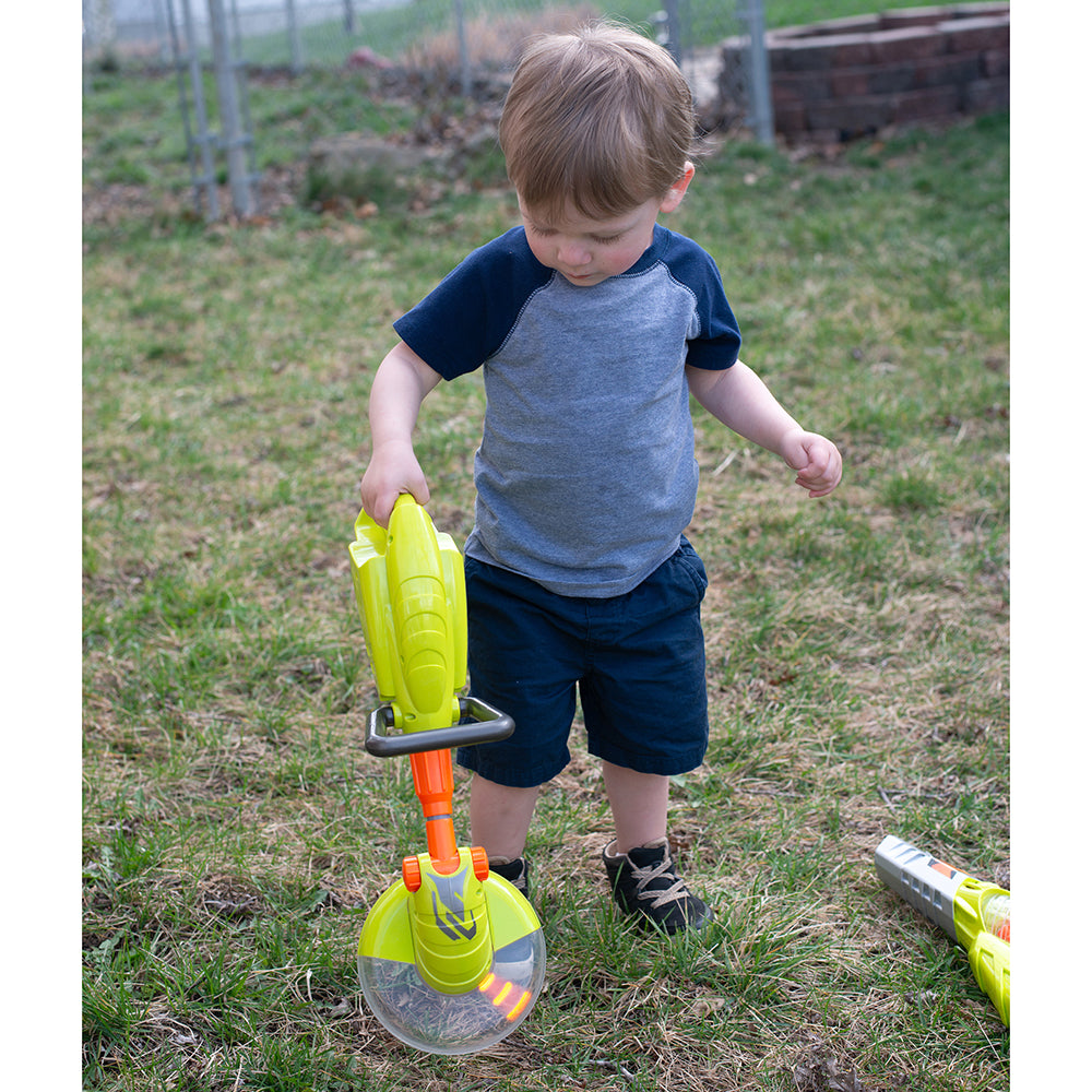 Toddler Using Pretend Weed Eater Outdoors
