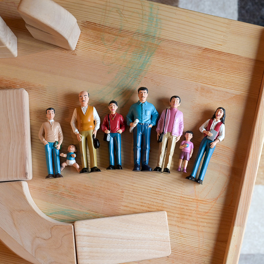 Set of Hispanic Figurines Laid Out on Tabletop