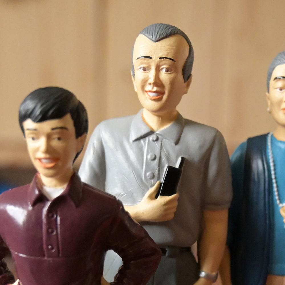 Close-up of Asian Grandpa Figure